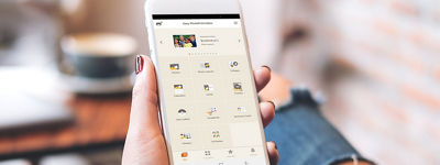 Person Using the Canon Easy PhotoPrint Editor on a Smart Phone