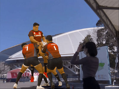 Person Wearing the Canon MREAL Headset Watching a Rugby Game