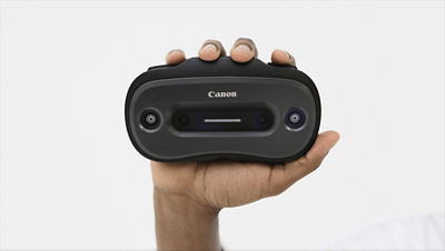 Person Holding the Canon MREAL Headset