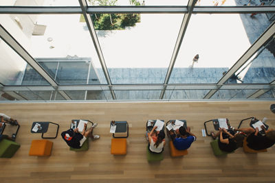 Birds Eye View of students working at desks in University