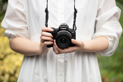 Person Holding EOS R50