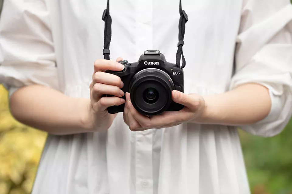 Person Holding EOS R50