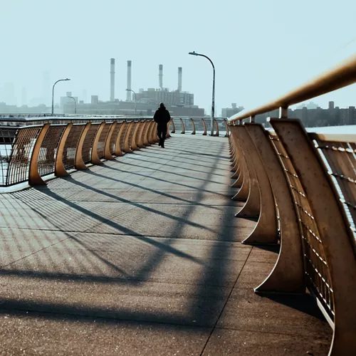 Image of walking bridge with person in distance