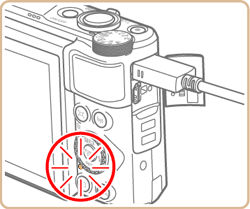 Using a USB cable to charge the camera's battery (PowerShot