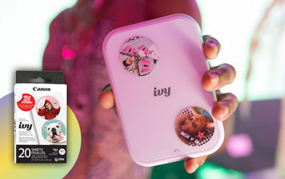 IVY 2 Being Held with Two Customized Stickers on it