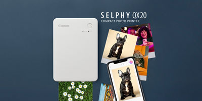 SELPHY Printer with Printed Images Around it