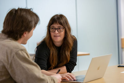 Krisanne Talking to a Student