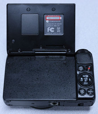 How to find the serial number location on a Canon PowerShot