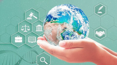 Childs hands holding the earth