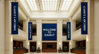 printed signs hanging in a hallway