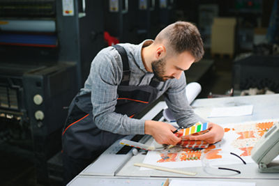 image of a man working with a color chart