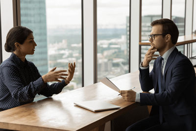 Two people working in an office