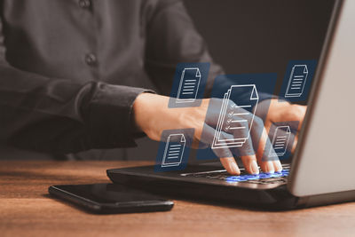 hands working on a keyboard