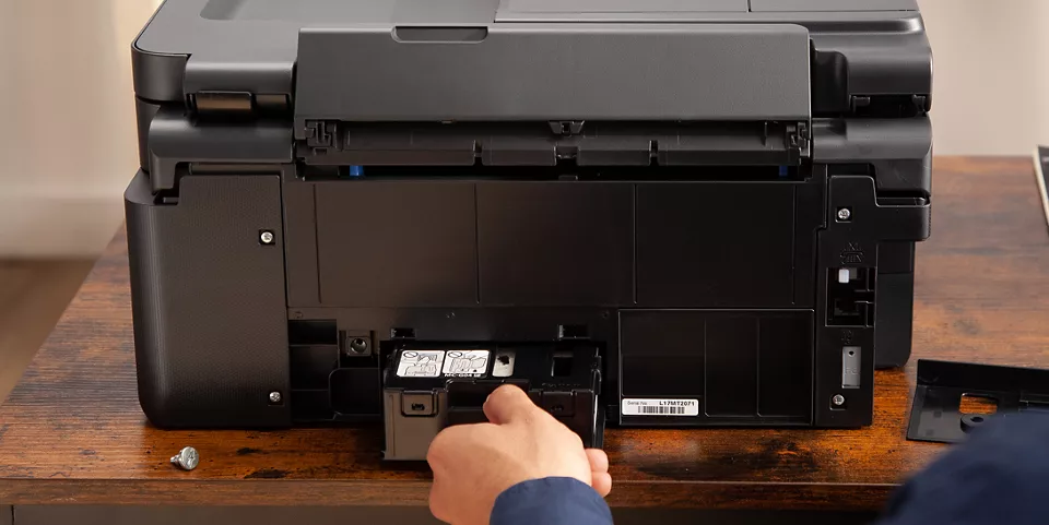 A close-up of the back of the PIXMA G4720 where the maintenance tank is easily accessible by a user