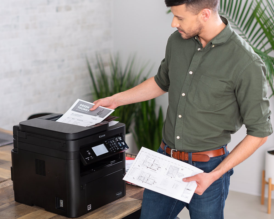 A man taking printouts