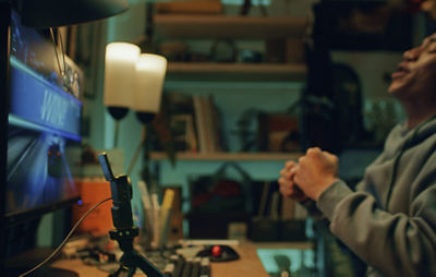 Person Using the PowerShot V10 as a Webcam