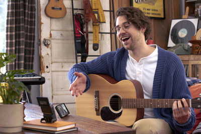 PowerShot V10 - Person and Pet Taking a Selfie