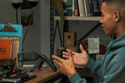 PowerShot V10 - Person Using it with a Tripod