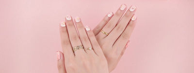 Hands Displaying Nail Stickers Made with the Printable Nail Sticker Creator