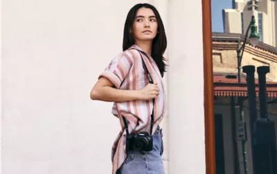 Photographer Holding an EOS R10