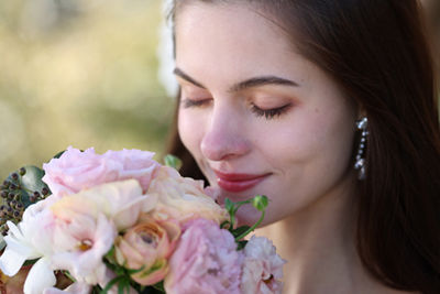 Person Holding Flowers