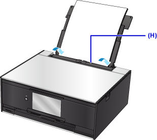 Feel slot cover in (H) in open position