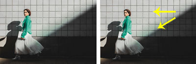 Leading line image of dark-haired model next to a tiled wall