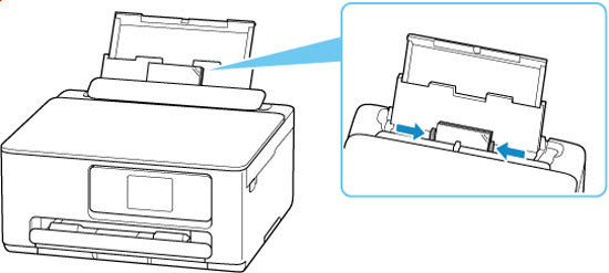 Slide the right paper guide to align both guides with the sides of the paper stack