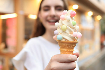 Person Holding an Ice Cream Cone