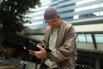 Person Using a Camera to Record a Video