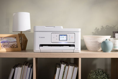 Canon Printer on a Home Bookshelf