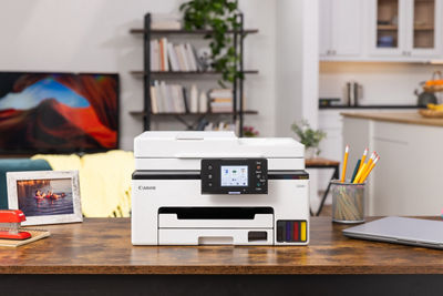 Canon Printer on a Home Bookshelf