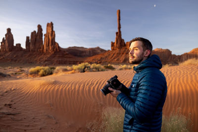Nathan Lee Holding a Camera