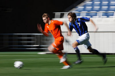 Soccer Players Trying to get the Ball