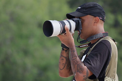 Person Using Camera to take Pictures