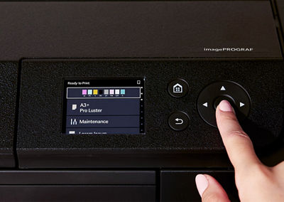 Person Using Printer Buttons