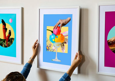 Person Hanging Up a Printed Poster