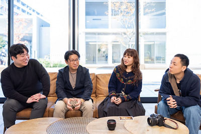 Natsuki Abe and Yasuaki Hagiwara of Canon, joined by photographers Sayaka Suzuki and Takahiro Mizushima