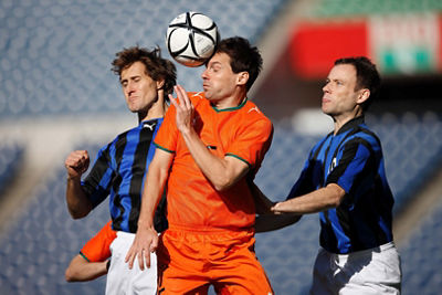 Soccer Players Trying to get the Ball