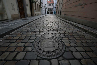 Sewer Cap in a Stone Walkway