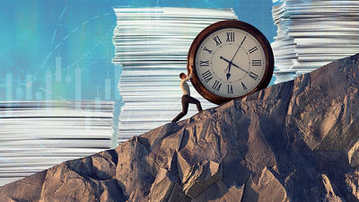 Image of a man pushing a clock up a hill