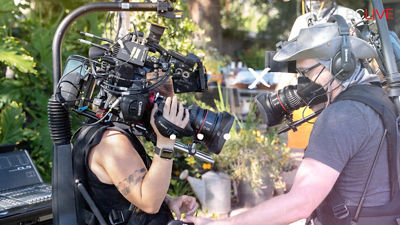 man holding cinema camera