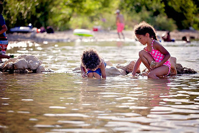 Children Playing in a River