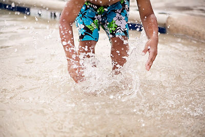 Child Playing in a River