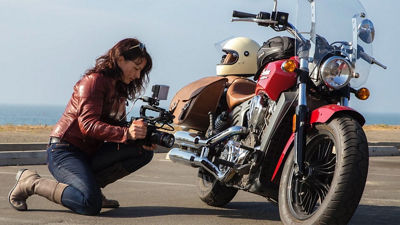 Person Using Canon Cinema Camera to Film Motorcycle