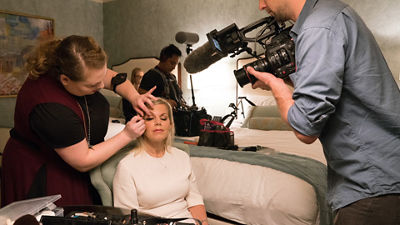 Person Using Canon Cinema Camera to Film Makeup Scene