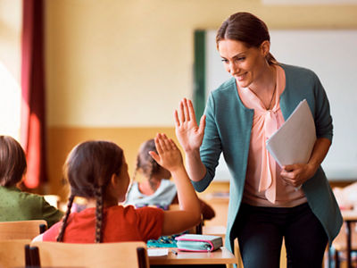 teacher in a classroom with childern