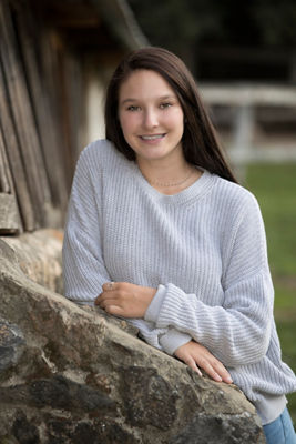 Girl posing on rock