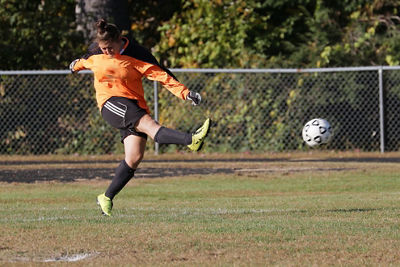 Soccer player kicking a ball