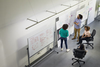 People Working on a Machine